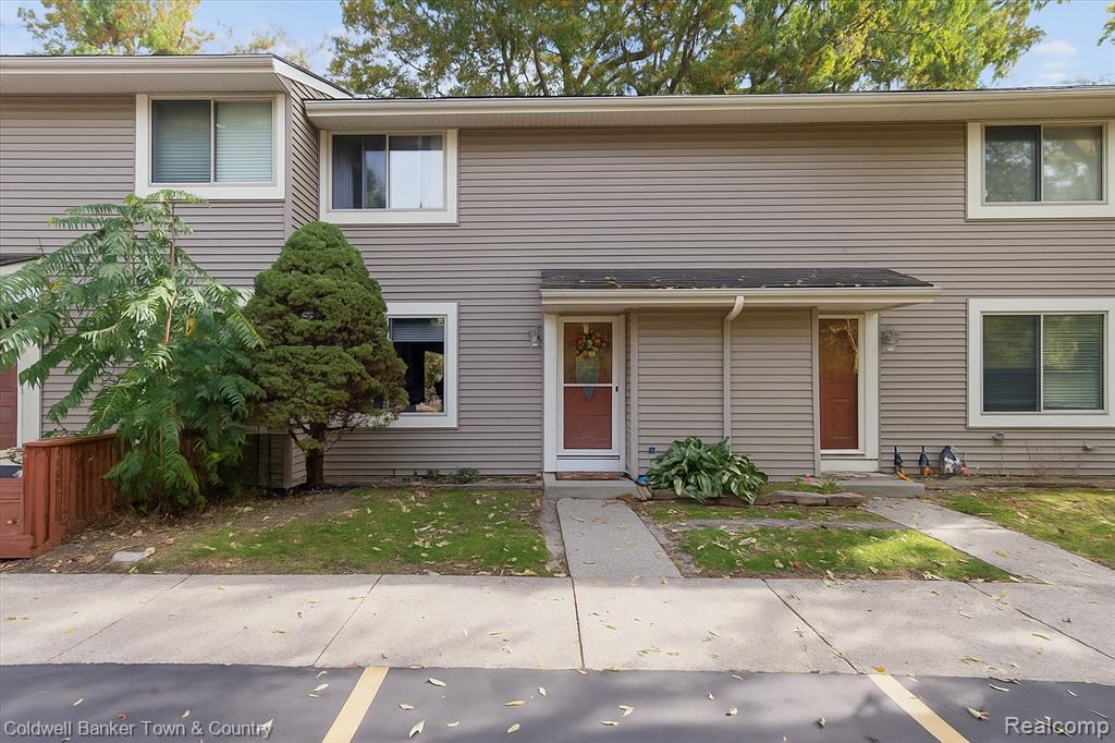 616 Rickett Road, 124, Brighton, MI 48116 — front exterior
