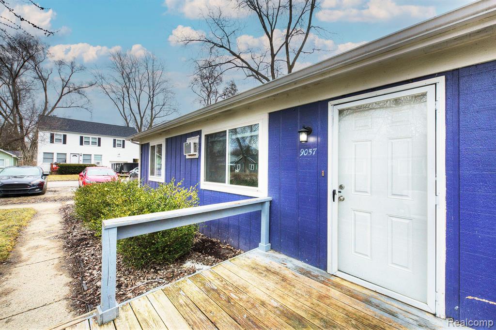 9057 GARFIELD Drive, Whitmore Lake, MI 48189 — front exterior