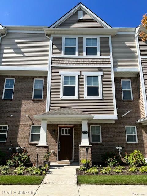 123 MONUMENT Lane, Wixom, MI 48393 — front exterior
