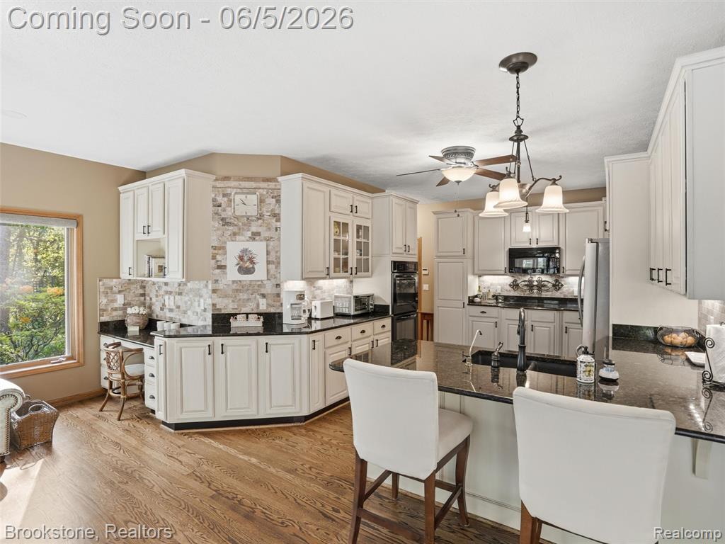 9523 Quail Ridge Run, Brighton, MI 48114 — Photo 36