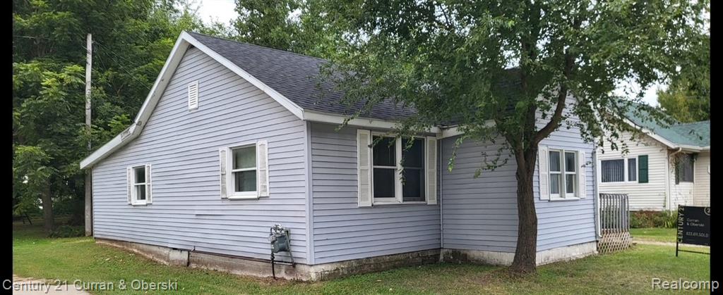 221 Saginaw Street, Beaverton, MI 48612 — front exterior