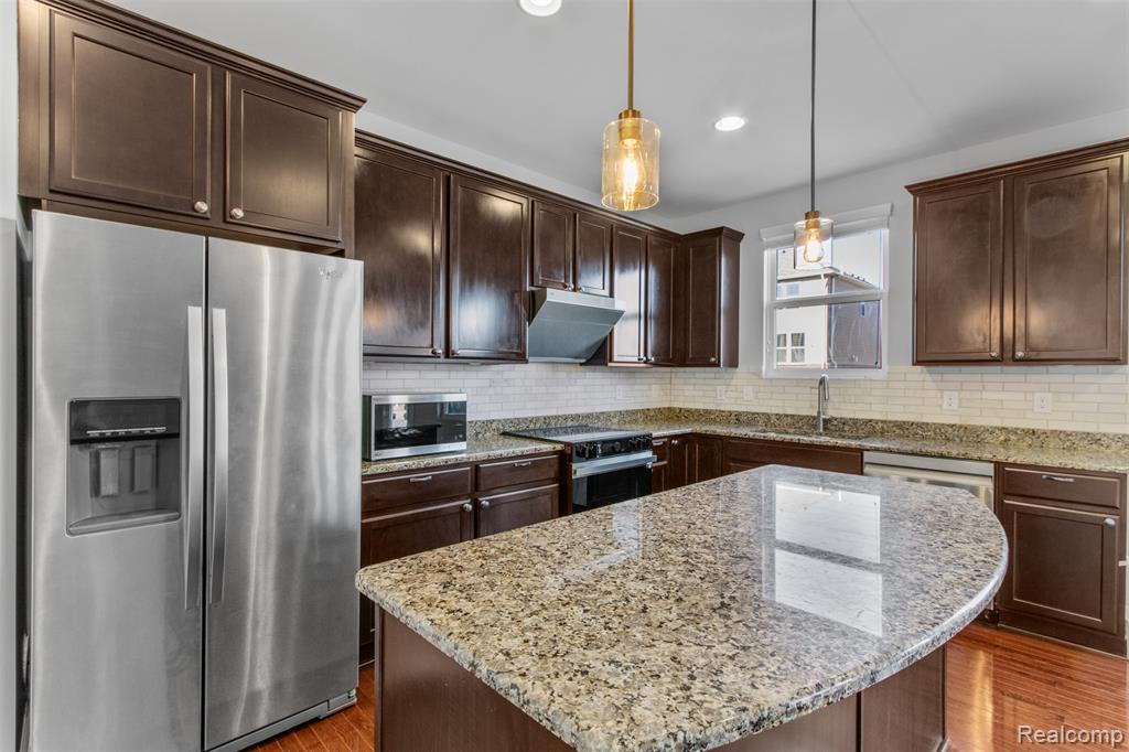 57570 Village Drive, New Hudson, MI 48165 — Photo 18