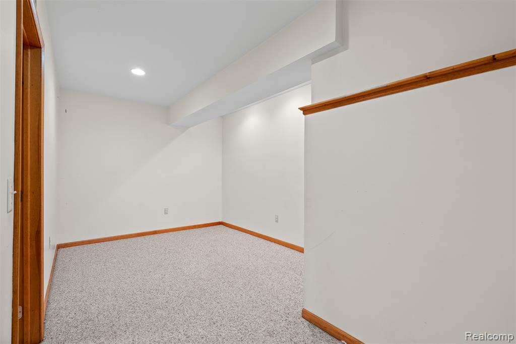 Basement featuring carpet flooring and recessed lighting