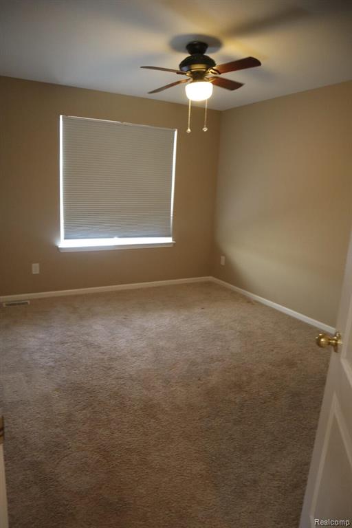 Unfinished below grade area with stairway and billiards