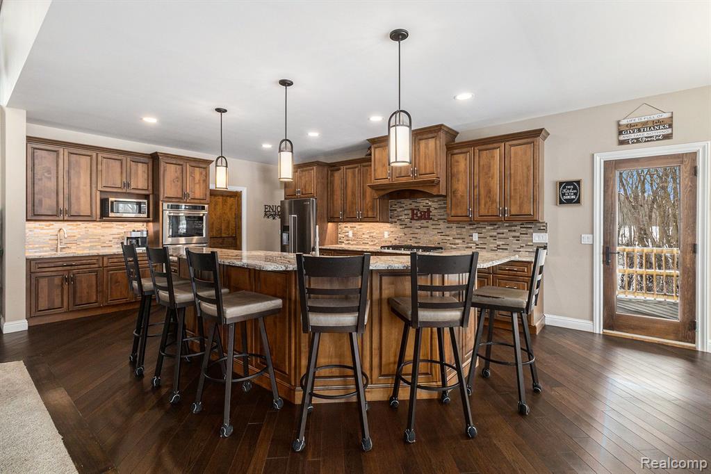 7196 MANOR Lane, Fowlerville, MI 48836 — Photo 12