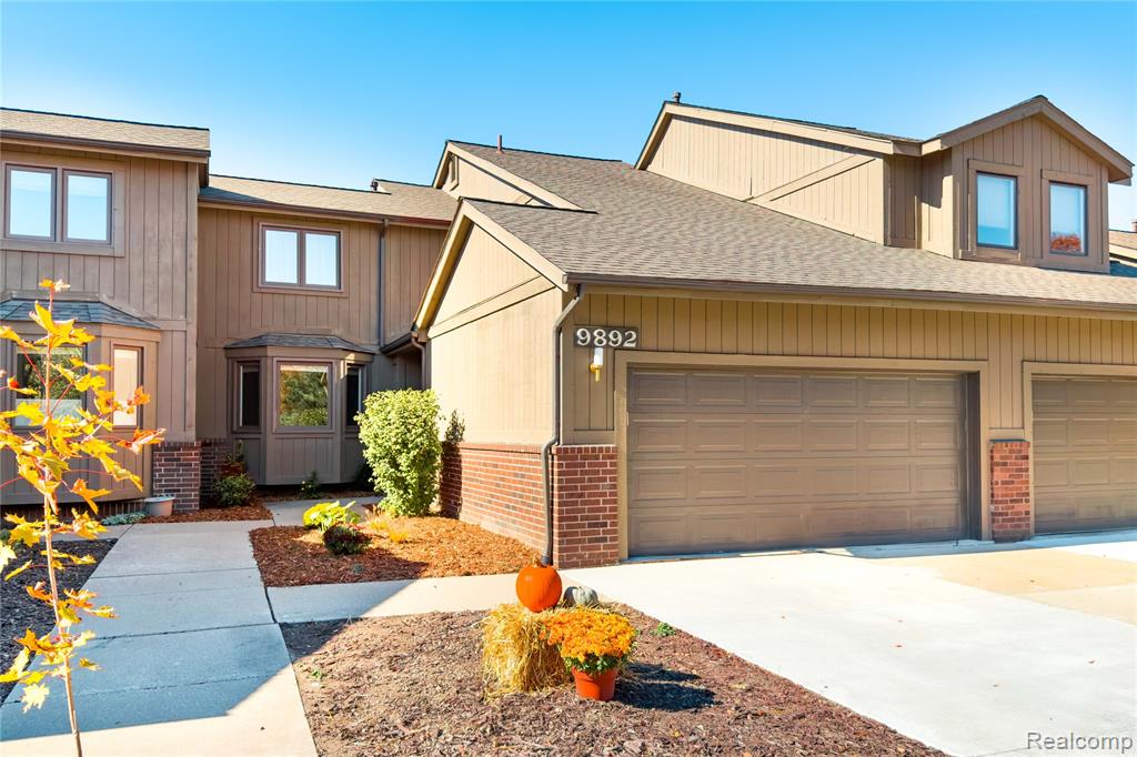 9892 Hawthorne Glen Drive, Grosse Ile, MI 48138 — front exterior