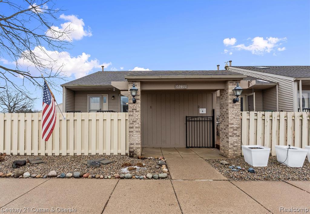 62401 Raleigh Court, 1, South Lyon, MI 48178 — front exterior