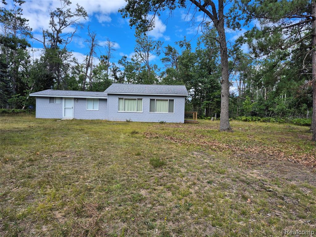 11864 Spikehorn Road, Johannesburg, MI 49751 — front exterior