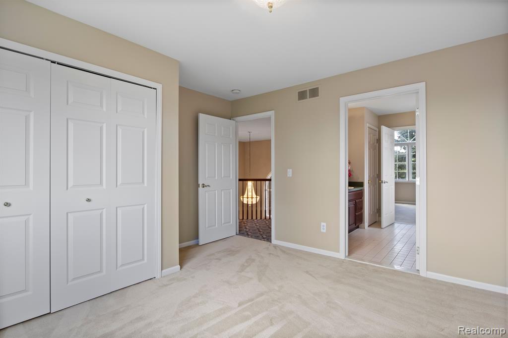8950 WOODLORE SOUTH Drive, Plymouth, MI 48170 — Photo 33