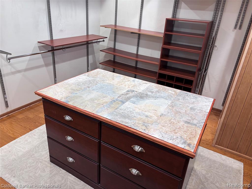 4th Bedroom or Walk in closet with light wood finished floors