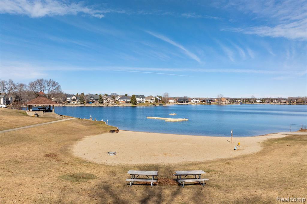 Water view featuring nearby suburban area