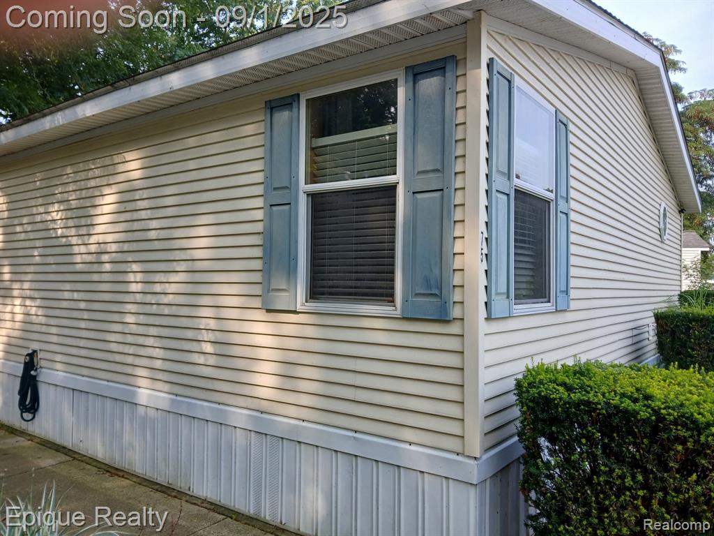 75 Carmell, Belleville, MI 48111 — front exterior