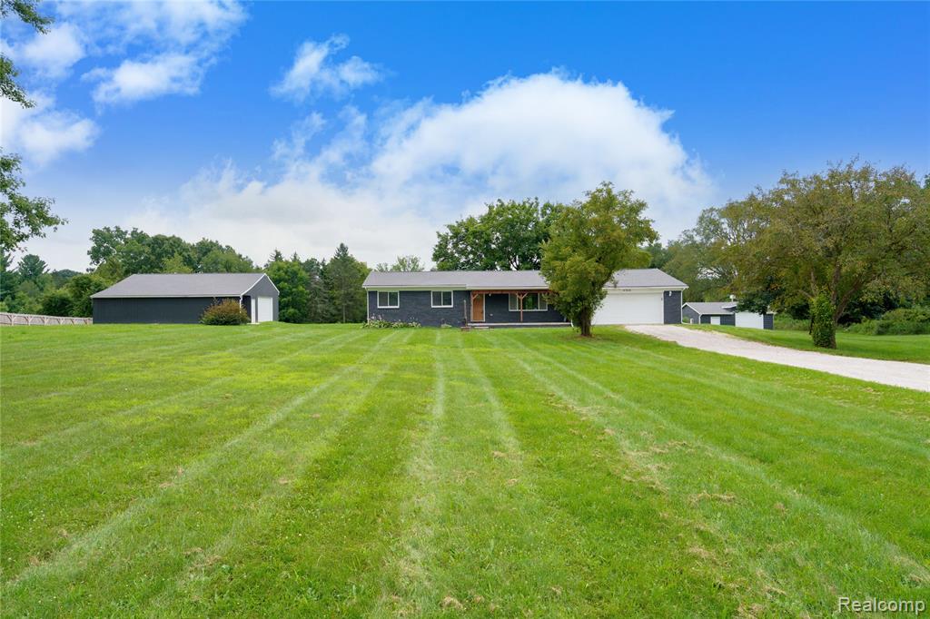 4566 Clyde Road, Howell, MI 48855 — front exterior