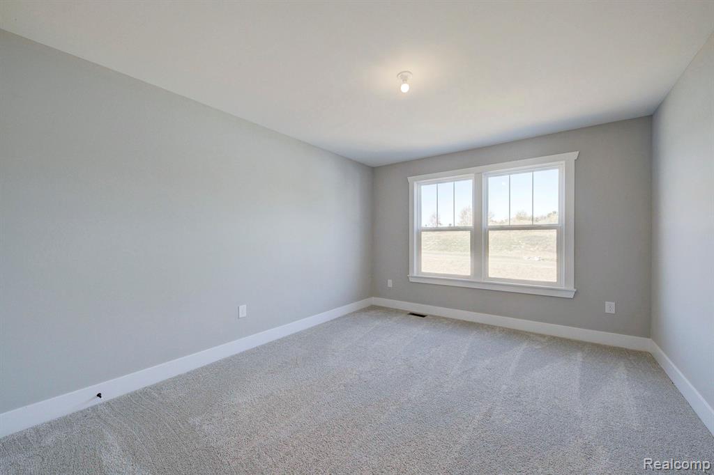 652 ROUND ROCK DR Drive, Howell, MI 48843 — Photo 16