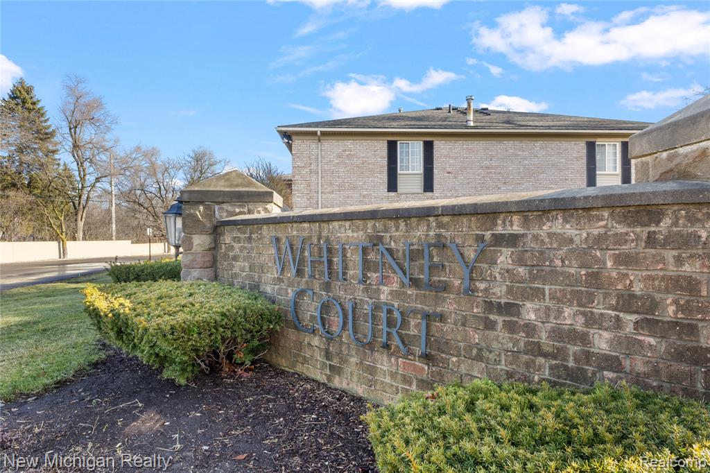 6103 Orchard Lake Road, 201, West Bloomfield, MI — front exterior