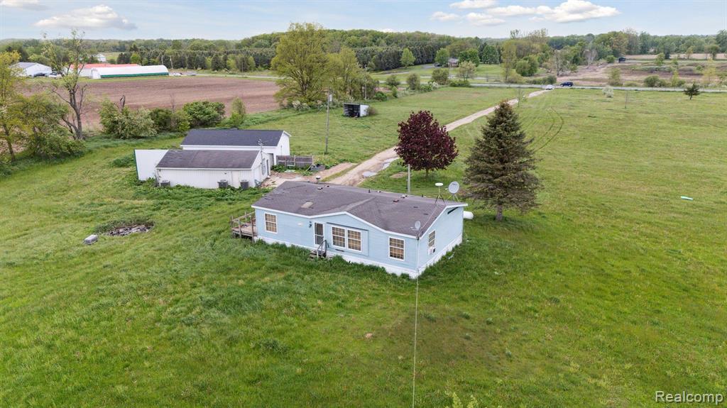1832 E CARSON CITY Road, Sheridan, MI 48884 — front exterior