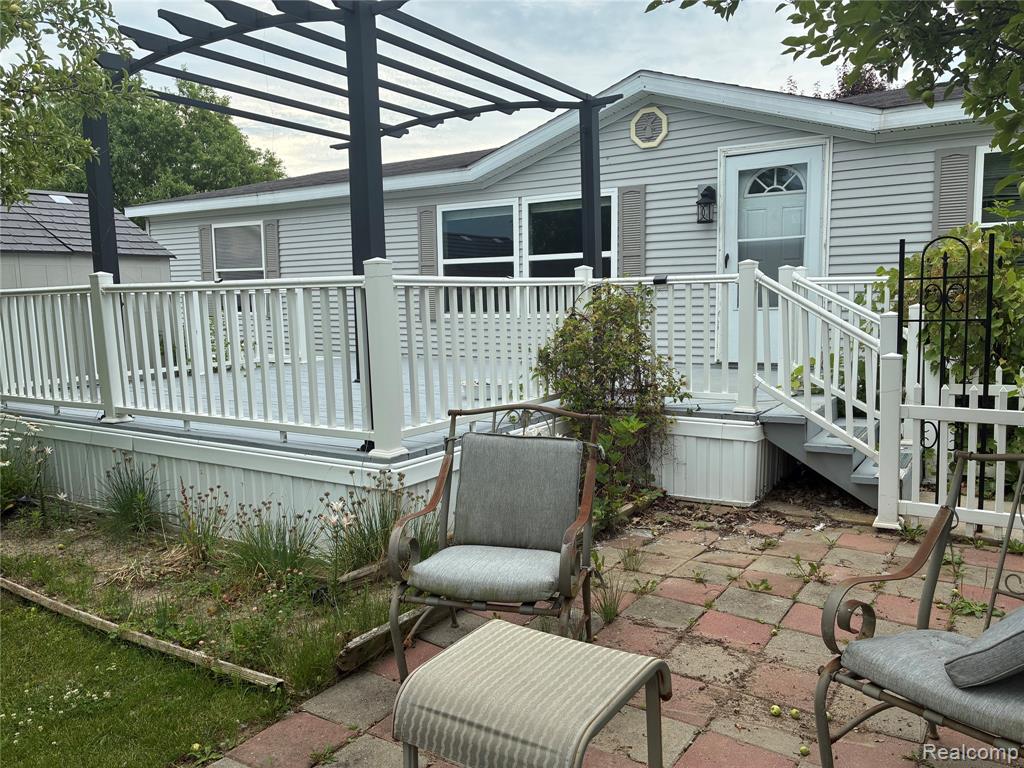 7364 Kings Court, Alma, MI 48801 — front exterior