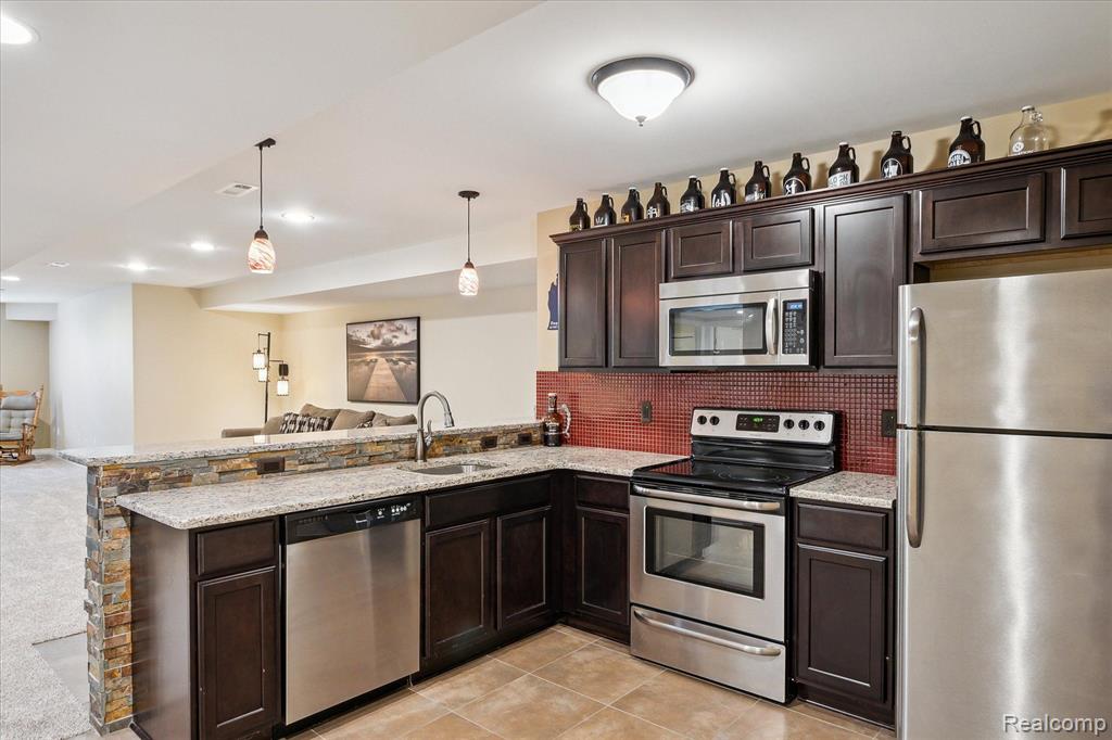 8504 Riverwalk Drive, Fenton, MI 48430 — Photo 49