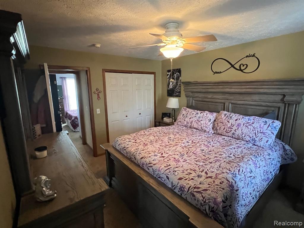 744 VILLAGE Drive, Fowlerville, MI 48836 — Photo 13