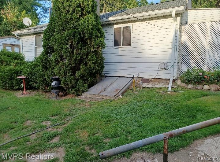 1721 Moffat Road, Leonard, MI 48367 — Photo 38