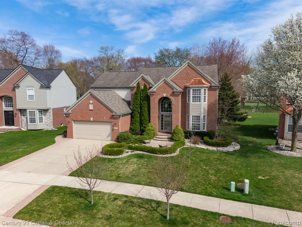 48742 Tanglewood Drive, Macomb, MI 48044 — front exterior