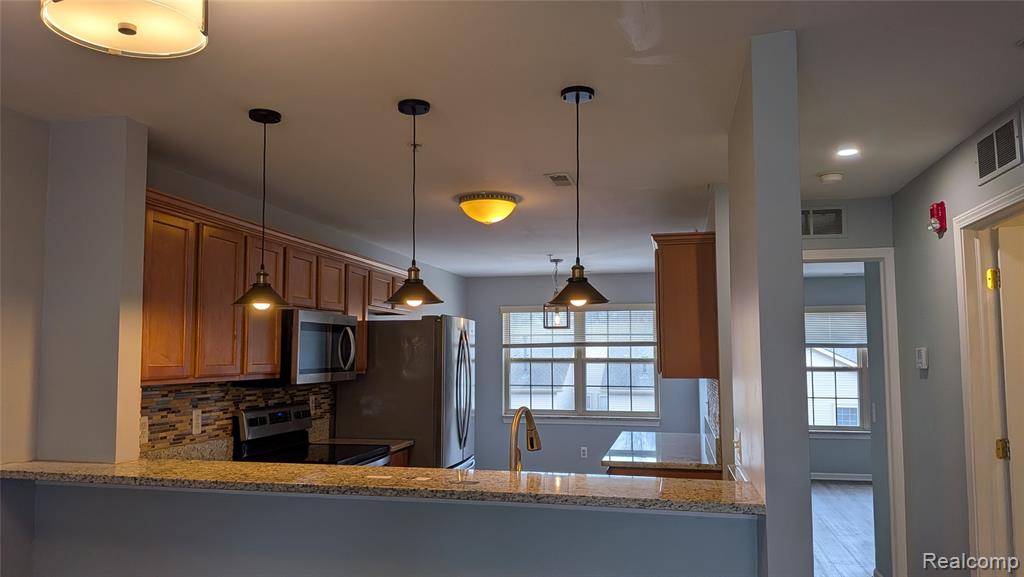 413 VILLAGE Drive, Walled Lake, MI 48390 — Photo 7