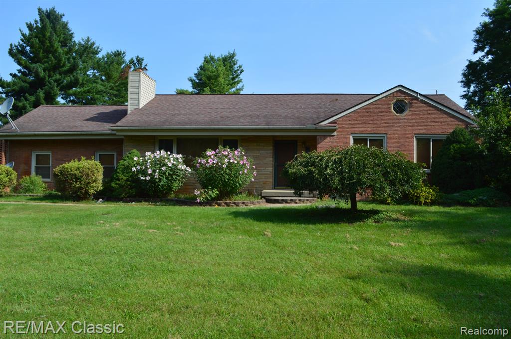 56000 9 MILE Road, South Lyon, MI 48178 — front exterior
