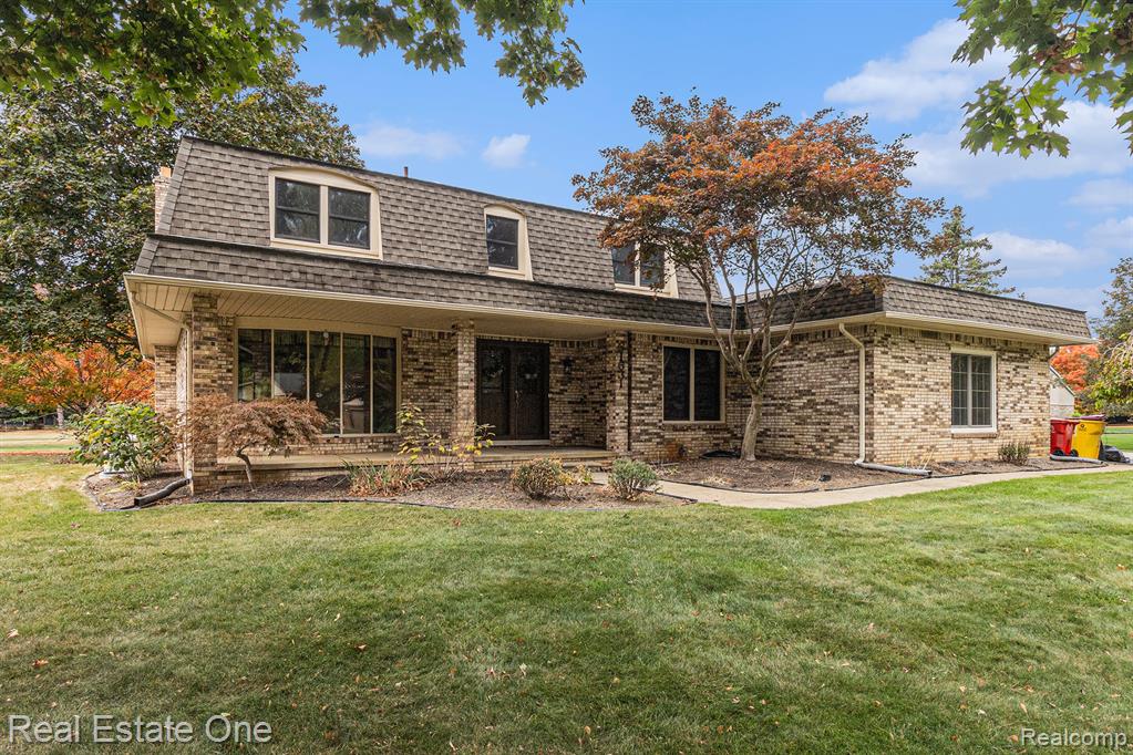 61631 Spring Circle Trail, Washington, MI — front exterior