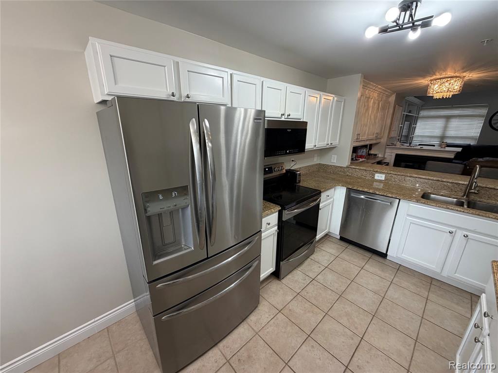 421 Village Drive, Walled Lake, MI 48390 — Photo 11