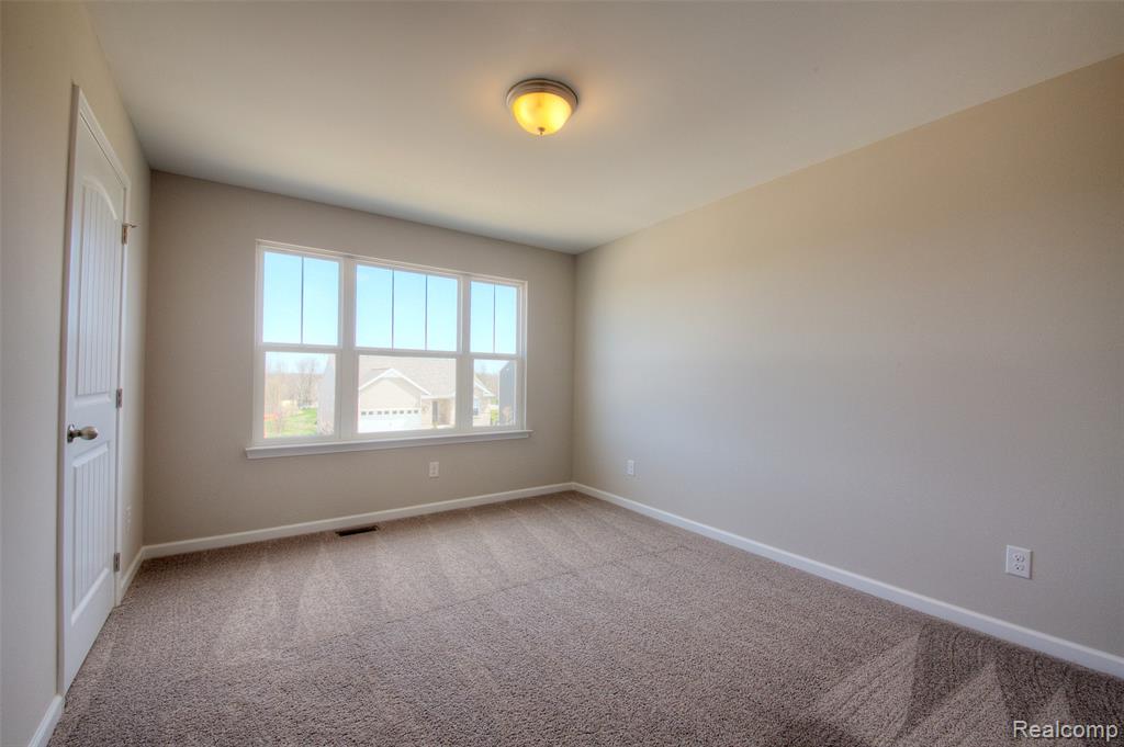 591 ROUND ROCK, Howell, MI 48843 — Photo 19