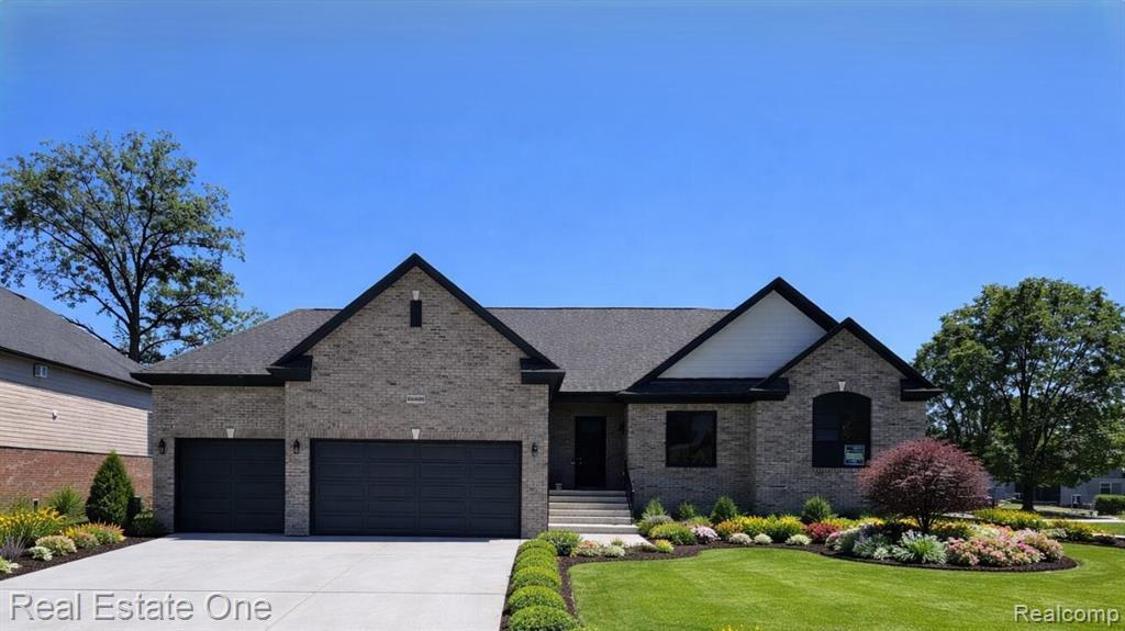 50402 Oakbrooke Drive E, Chesterfield, MI 48047 — front exterior
