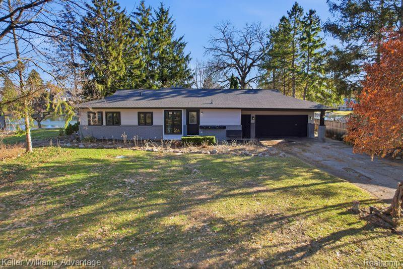 1210 Craven Drive, Highland, MI 48356 — Photo 39
