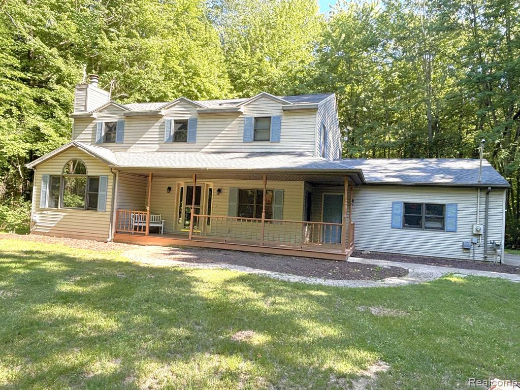 12057 Three Oaks Drive, St. Charles, MI 48655 — front exterior