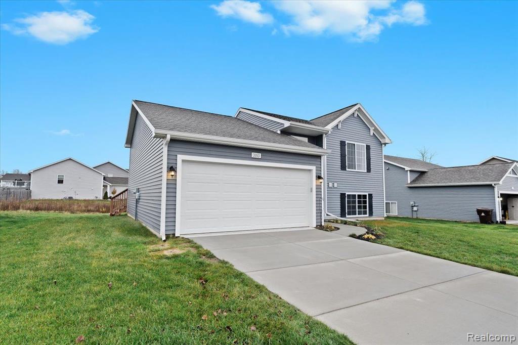 3103 IVY WOOD Circle, Howell, MI 48855 — Photo 2