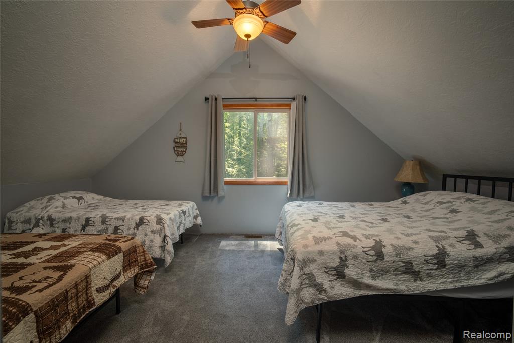6954 AARWOOD Trail NW, Rapid City, MI 49676 — Photo 20