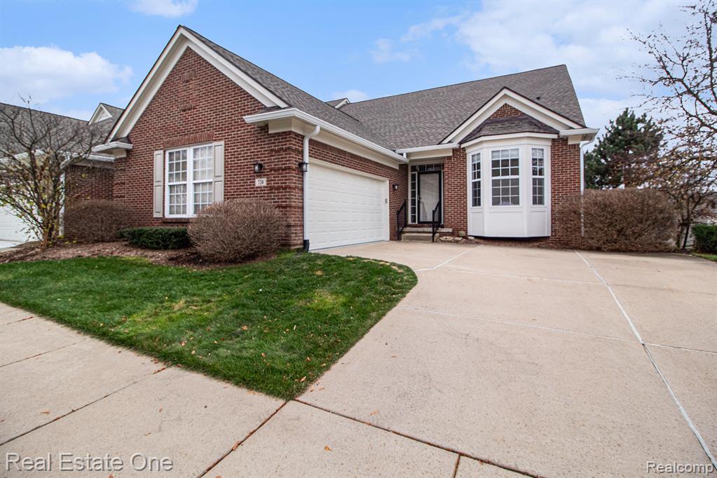 724 Knolls Landing Drive, 18, Milford, MI 48381 — front exterior