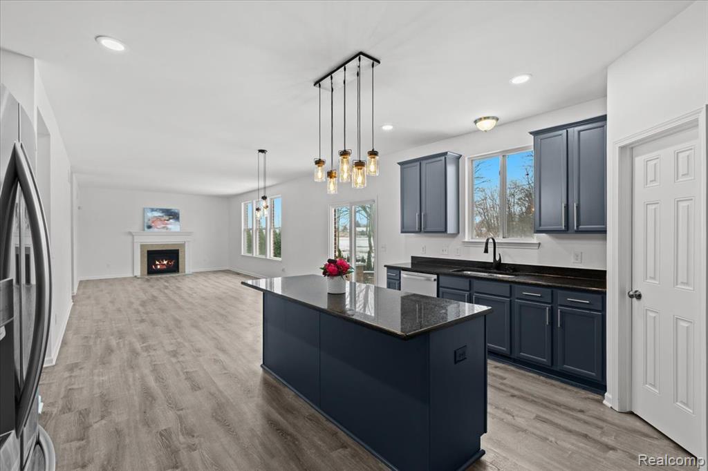 Carpeted empty room featuring baseboards