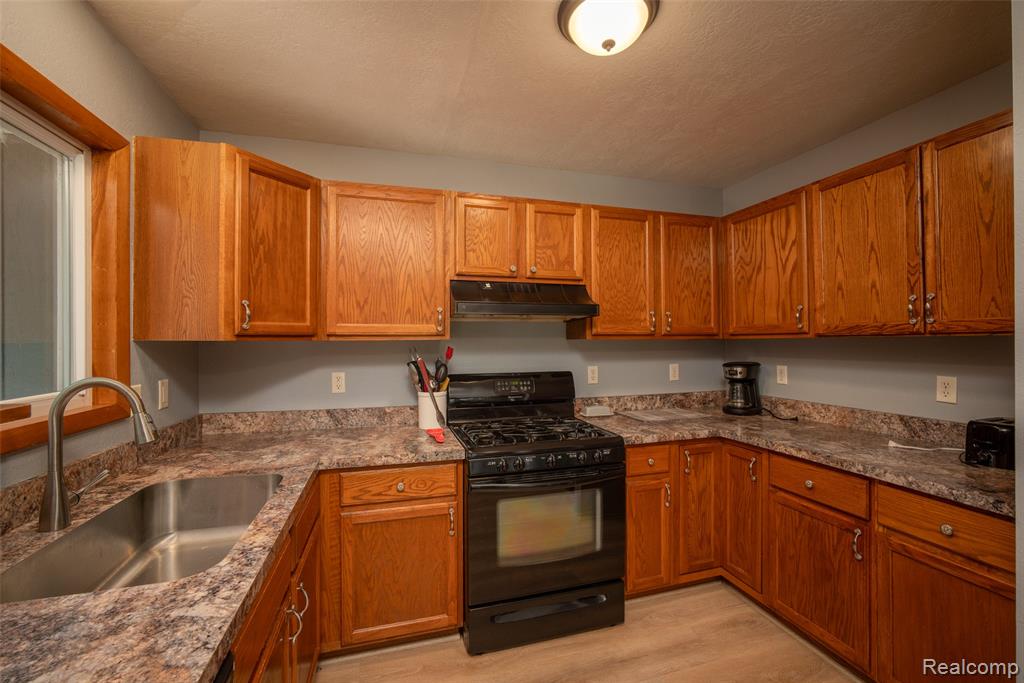 6954 AARWOOD Trail NW, Rapid City, MI 49676 — Photo 17