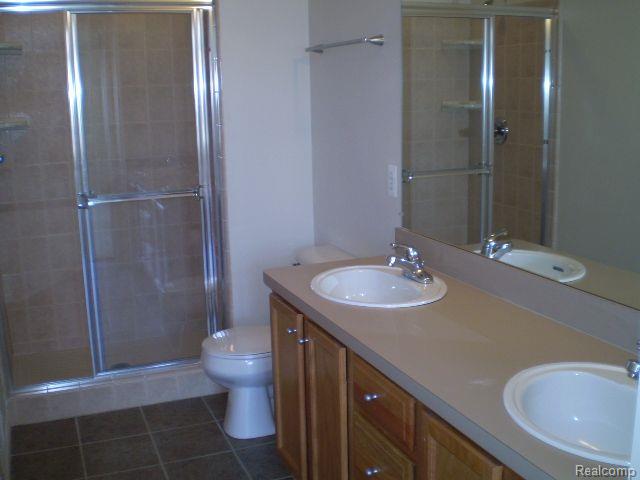 410 BOARDWALK Drive, Walled Lake, MI 48390 — Photo 5