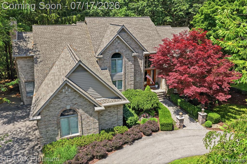 5458 Lake Ridge Drive, Brighton, MI 48116 — front exterior