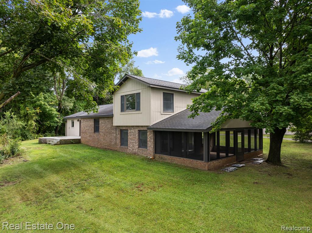 8771 HAMBURG Road, Brighton, MI 48116 — front exterior