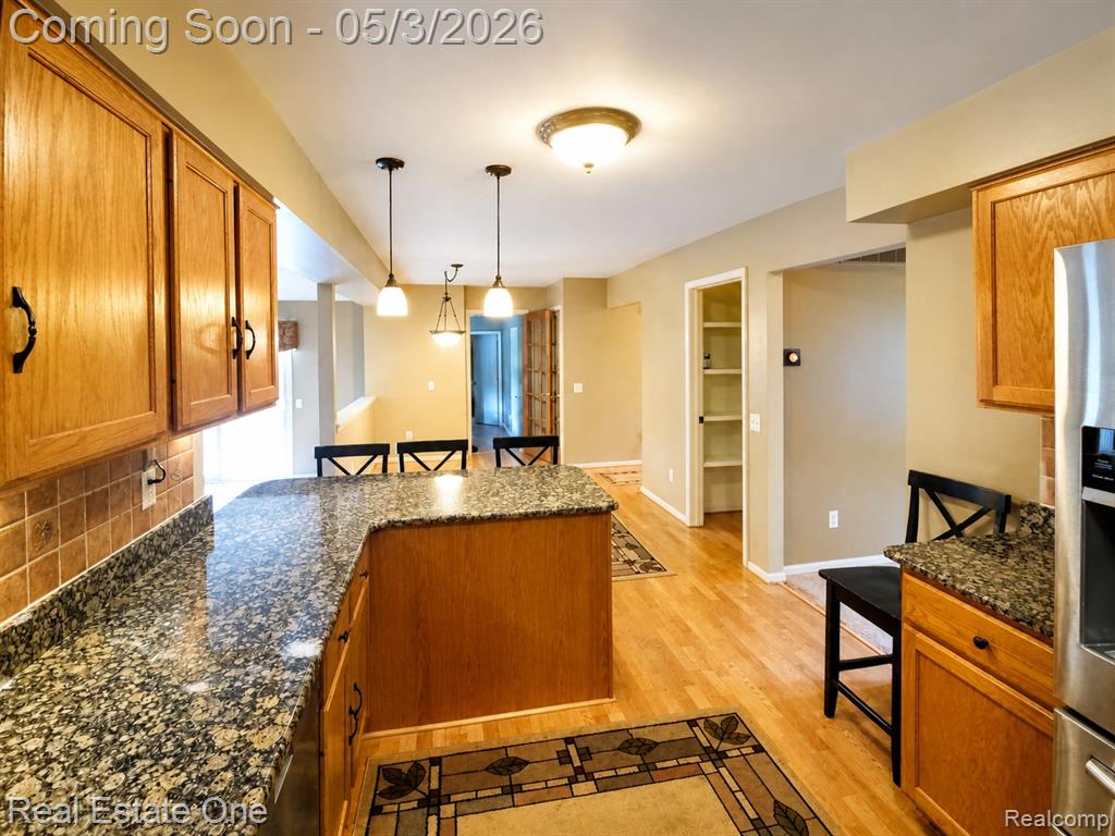 4656 Desert Bridge Court, Highland, MI 48356 — Photo 10