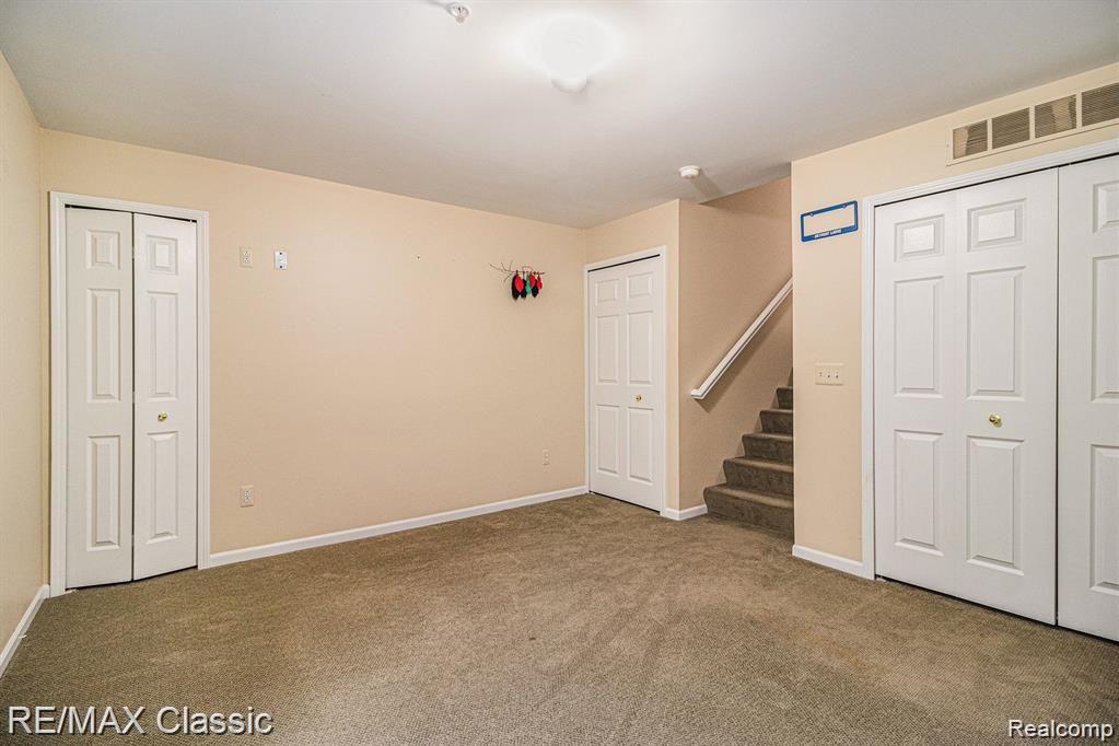 428 Boardwalk Drive, Walled Lake, MI 48390 — Photo 21