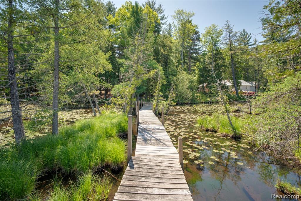 6954 AARWOOD Trail NW, Rapid City, MI 49676 — Photo 43