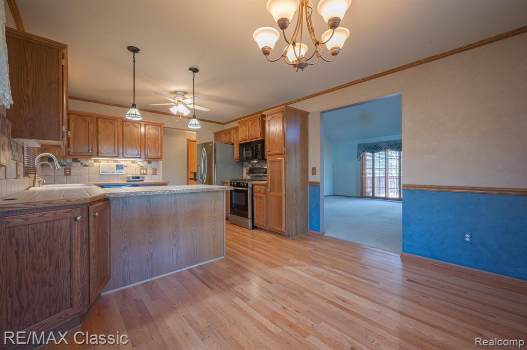1049 ELMWOOD Drive, 13, Brighton, MI 48116 — Photo 5