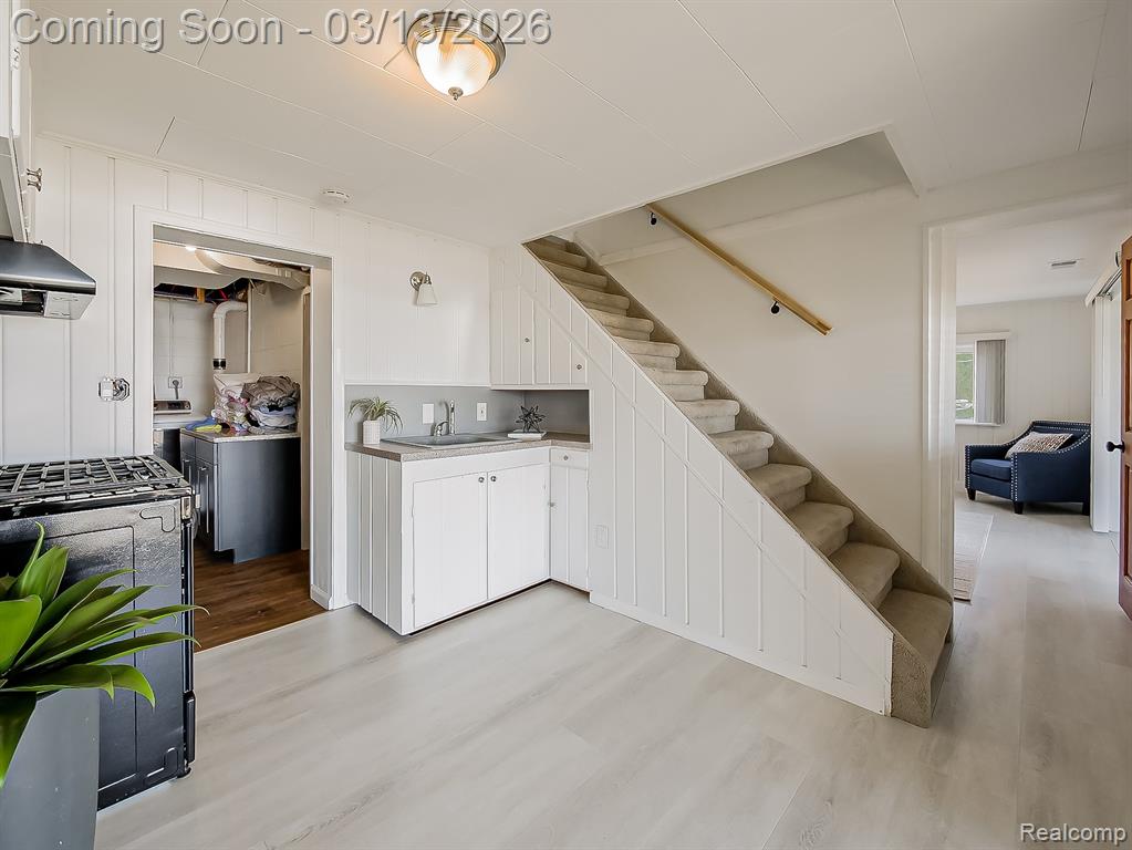 Home office with wood walls and baseboards
