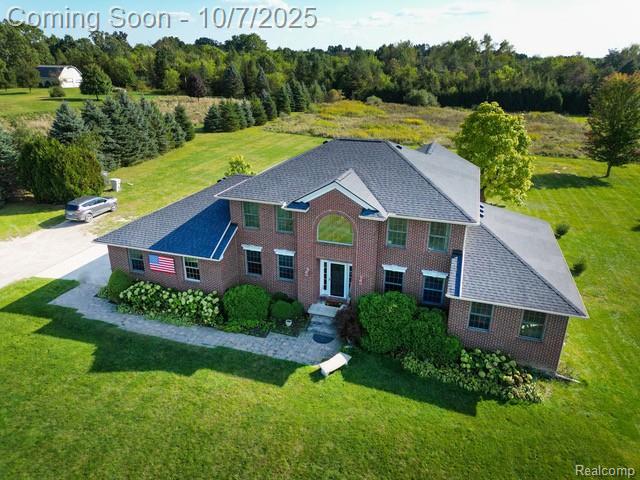 8660 Spicer Road, Brighton, MI 48116 — front exterior