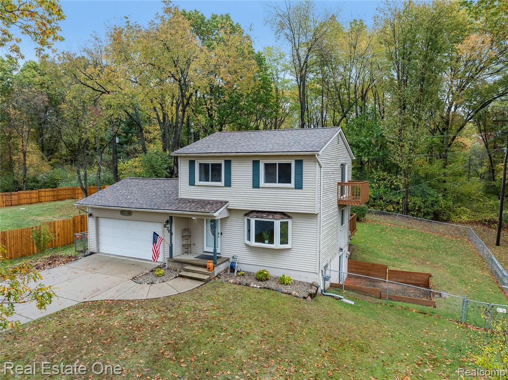 8789 Fieldcrest Drive, Brighton, MI 48116 — front exterior