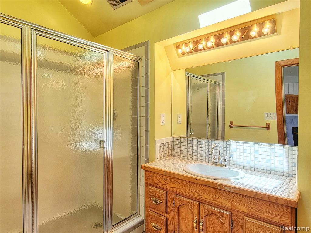 712 Wolverine Drive, Wolverine Lake, MI 48390 — Photo 19