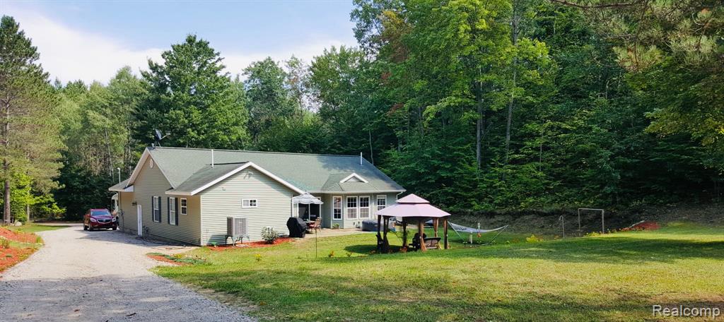 9447 MENOMINEE Trail, Gaylord, MI 49735 — Photo 2